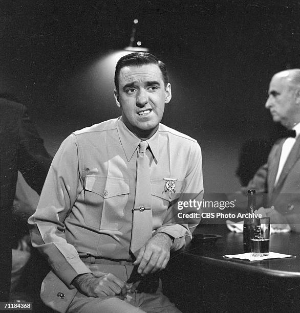 American actor Jim Nabors sits at a bar in an episode of the television comedy series 'Gomer Pyle, USMC' called 'Sgt. Carter Gets A 'Dear John...