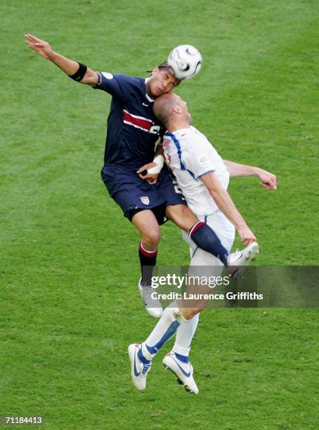 Oguchi Onyewu of USA challenges in the air with Jan Koller of Czech Republic during the FIFA World Cup Germany 2006 Group E match between USA and...