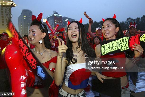 South Korean fans watch the public viewing of the FIFA World Cup Germany 2006 group G match between South Korea and Togo in front of City Hall on...