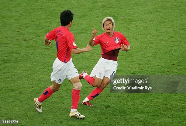 Chun-Soo Lee of South Korea celebrates scoring the equalizing goal with team mate Jin-Chul Choi during the FIFA World Cup Germany 2006 Group G match...