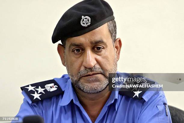 New Iraqi police chief of the southern city of Basra Brigadier General Sami Kazem al-Jaber attends a press conference in Basra, 13 May 2006. The...