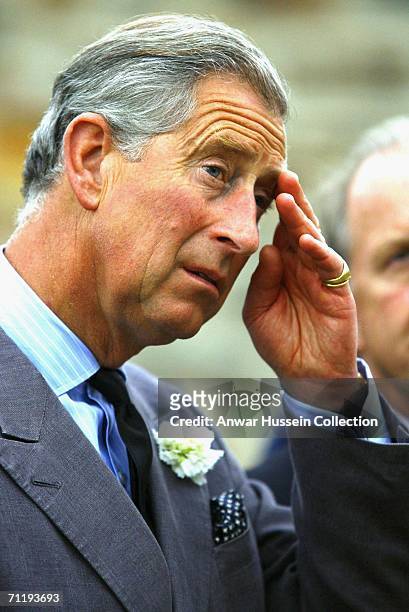Prince Charles, the Prince of Wales, visits a housing development which has been built on land previously owned by The Duchy of Cornwall, June 13,...