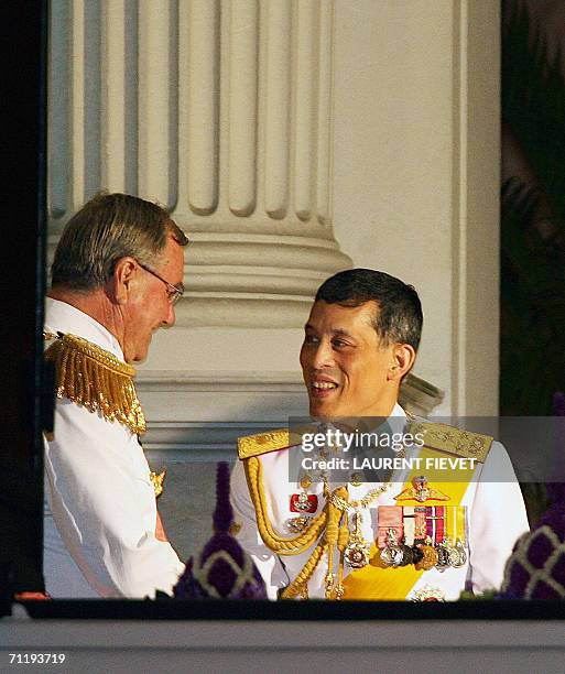 Danish Prince Consort Henrik is welcomed by Thai Crown Princess Maha Chakri Sirindhorn upon arriving at the Grand Palace in Bangkok, 13 June 2006 for...