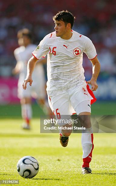 Tranquillo Barneta of Switzerland runs with the ball during the FIFA World Cup Germany 2006 Group G match between France and Switzerland at the...