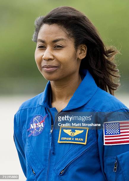 Mission Specialist Stephanie Wilson addresses the media after the astronauts for NASA's next Space Shuttle Mission, STS-121, arrived at the shuttle...