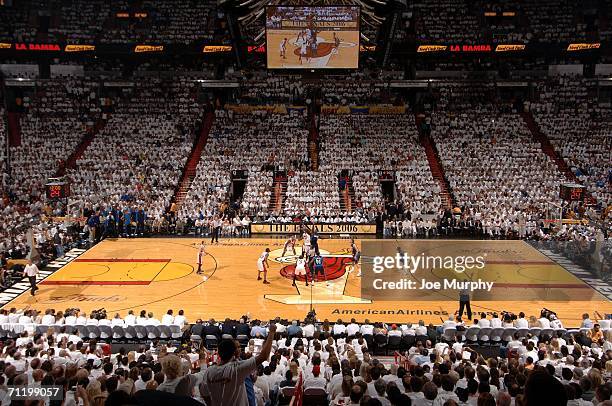 Shaquille O'Neal of the Miami Heat jumps for the ball against DeSagana Diop of the Dallas Mavericks to start Game Three of the 2006 NBA Finals on...