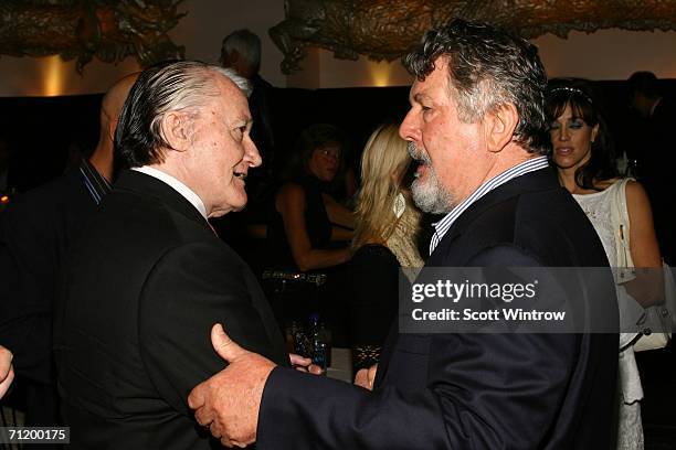 Actor Robert Vaughn and Director Walter Hill chat during the premiere screening of AMC's "Broken Trail" after party at Shun Lee Palace on June 13,...