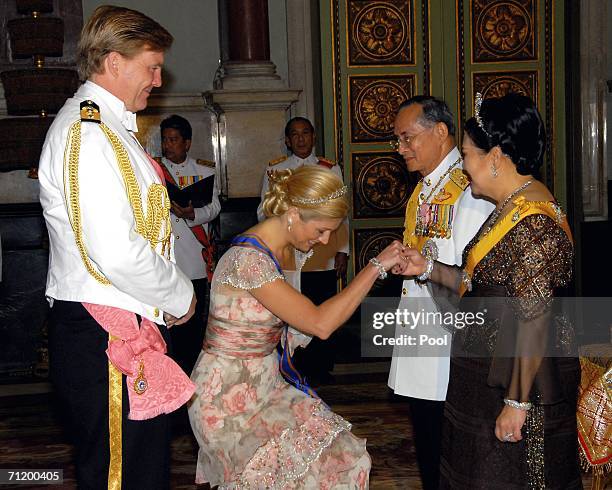 Thailand's King Bhumibol Adulyadej and Queen Sirikit greet Dutch Prince of Orange Willem Alexander and Dutch Princess Maxima as they attend the Royal...