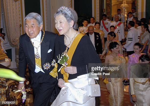 Emperor Akihito of Japan and Empress Michiko of Japan attend the Royal banquet at the Golden Palace on June 13, 2006 in Bangkok. The king of Thailand...