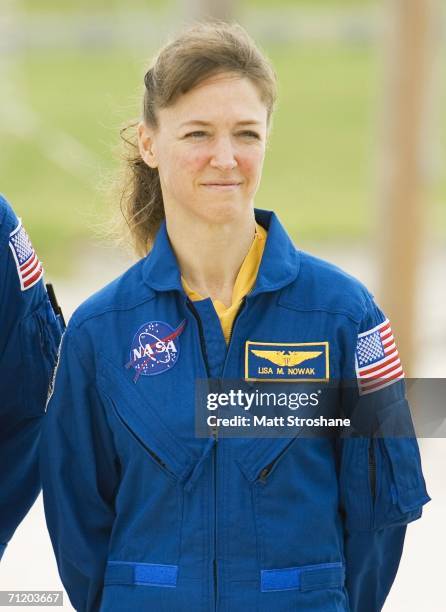 Mission specialist Lisa Nowak participates in a launch pad press conference held by astronauts for NASA's next Space Shuttle mission, STS-121, June...