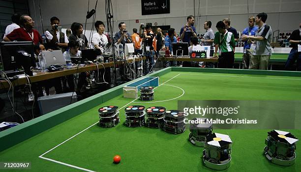 Small size robots in action during the Robocup 2006 at the Congress Centre on June 14, 2006 in Bremen, Germany. More than 400 teams, playing in 11...