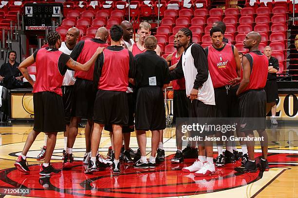 The Miami Heat hudle up during a team practice prior to Media Availability the day before Game Four of the 2006 NBA Finals June 14, 2006 at American...