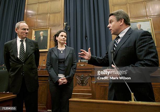 Rep. Christopher Smith speaks while Julia Ormond , actress and goodwill ambassador for the UN Office on Drugs and Crime, and John Miller , State...