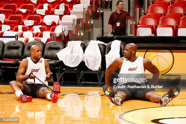 Antoine Walker and Shaquille O'Neal of the Miami Heat stretches at a practice during Media Availability the day before Game Four of the 2006 NBA...