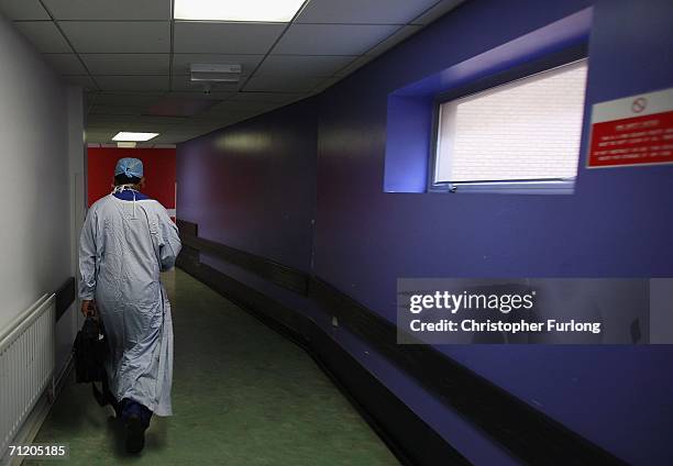 Surgeon makes his way home after working in theatre at The Queen Elizabeth Hospital on 14 June Birmingham, England. Senior managers of the NHS have...