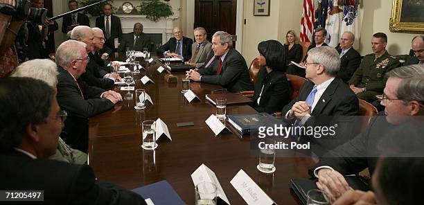President George W. Bush meets with the Iraq Study Group in the Roosevelt Room of the White House on June 14, 2006 in Washigton, DC. Attending the...
