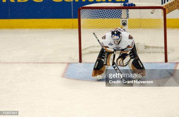 Goaltender Jussi Markkanen of the Edmonton Oilers reacts after giving up a goal in the second period of game five of the 2006 NHL Stanley Cup Finals...