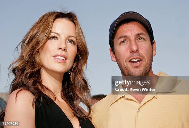 Actress Kate Beckinsale and actor Adam Sandler arrive at Sony Pictures premiere of "Click" held at the Mann Village Theater on June 14, 2006 in...
