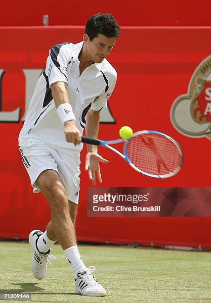 Tim Henman of Great Britain in action against Nicolas Mahut of France during Day 4 of the Stella Artois Championships at Queen's Club on June 15,...