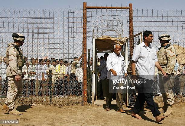 Iraqis leave the prison compound as another batch of 200 prisoners are freed from Abu Ghraib prison on June 15, 2006 in Baghdad, Iraq. Prime Minister...