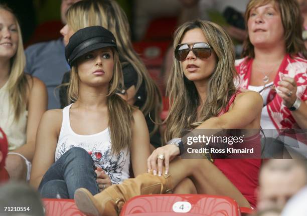 Singer Cheryl Tweedy, girlfriend of Ashley Cole and Victoria Beckham, wife of England Captain David Beckham, attend the FIFA World Cup Germany 2006...