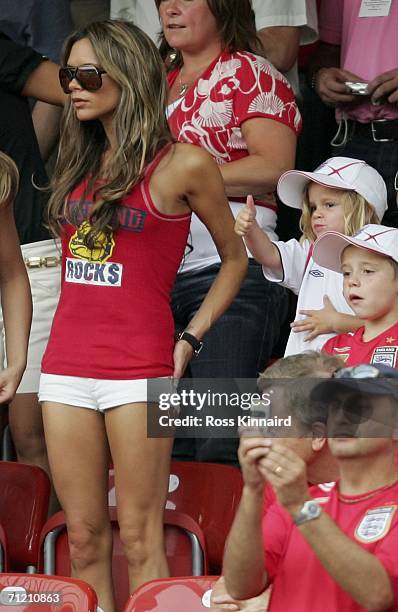 Victoria Beckham, the wife of England captain David Beckham, and their sons Romeo and Brooklyn, attend the FIFA World Cup Germany 2006 Group B match...