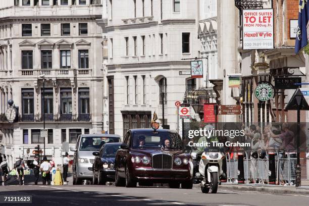 Queen Elizabeth II arrives by Royal motorcade at St Paul's Cathedral for a service of thanksgiving held in honour of her 80th birthday, June 15, 2006...