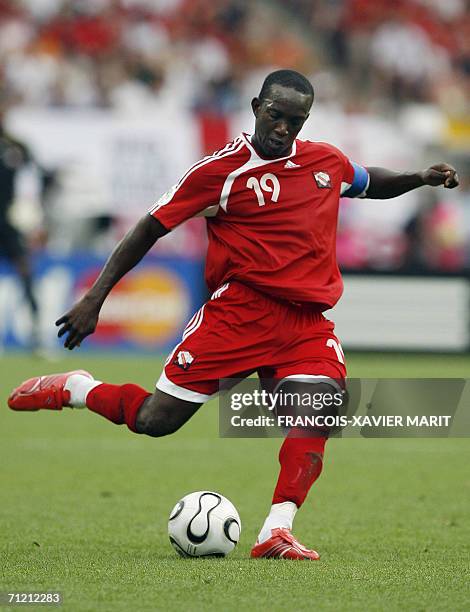 Trinidad and Tobago's forward Dwight Yorke is seen playing against England in their opening round Group B World Cup football match at Nuremberg's...