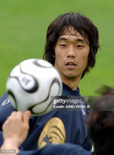 South Korean forward Park Chu Young looks at the ball during a training session at the Bay-Arena in Leverkusen, 15 June 2006. South Korea defeated...