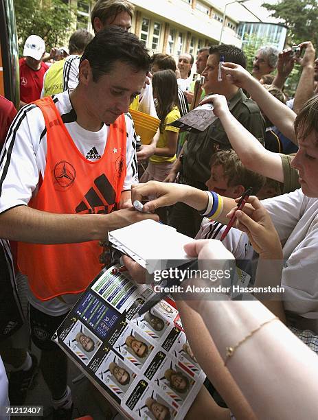 Oliver Neuville of Germany signing autographs after the German National Team training session on June 15, 2006 in Berlin, Germany