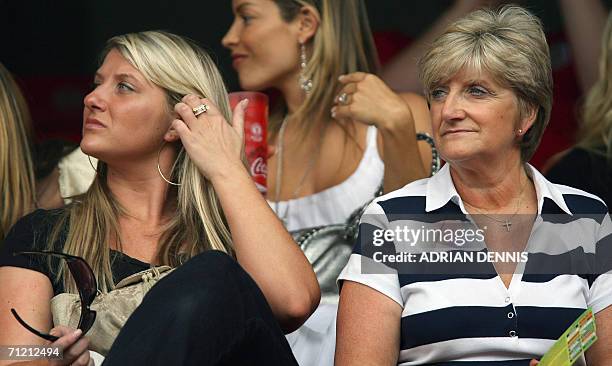 The mother of England's captain David Beckham, Sandra , sits with her daughter Joanne at Nuremberg's Franken Stadium before the start of the opening...