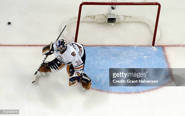 Goaltender Jussi Markkanen of the Edmonton Oilers protects the goal against the Carolina Hurricanes during game five of the 2006 NHL Stanley Cup...