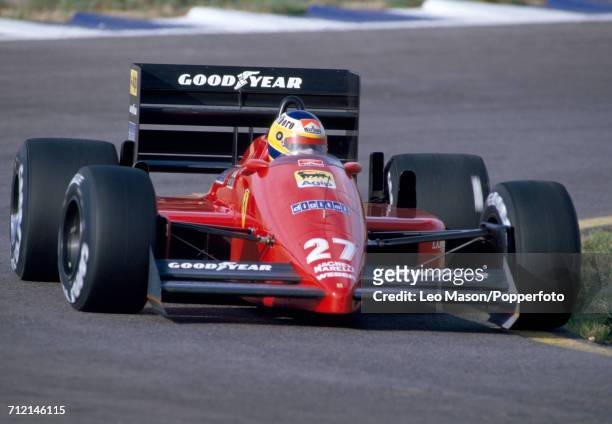 Michele Alboreto of Italy enroute to a fifteenth place finish, driving a Ferrari F1/87 with a Ferrari 033E 1.5 V6t engine for Team Scuderia Ferrari...