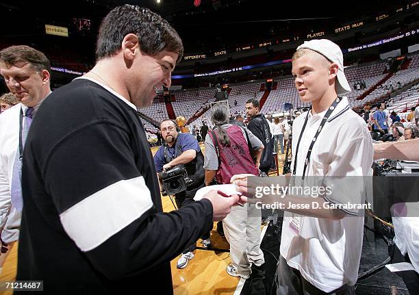 High school basketball player Jason McElwain meets Mark Cuban, team owner, of the Dallas Mavericks prior to Game Four of the 2006 NBA Finals against...