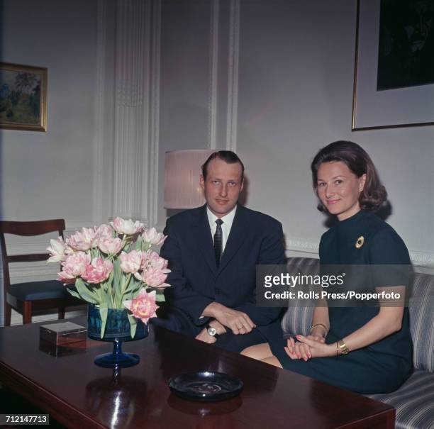 Crown Prince Harald of Norway pictured with his wife Sonja Haraldsen at a reception in London in March 1969.