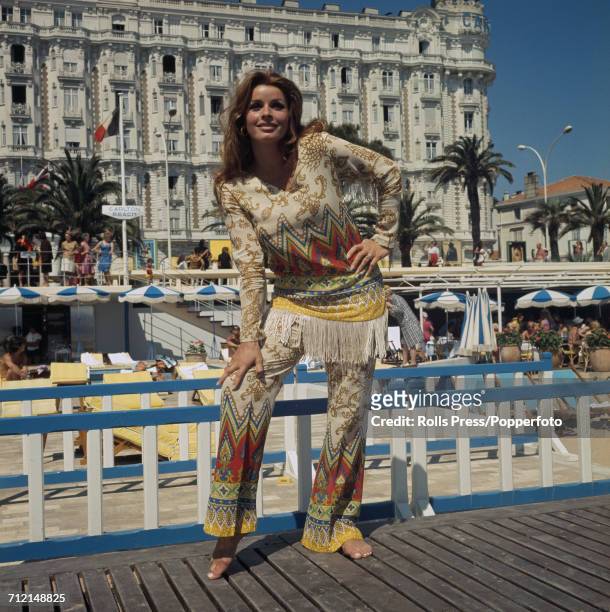 Austrian actress Senta Berger posed wearing a native american style outfit on Carlton Beach in front of the Carlton Hotel in Cannes, France on 3rd...