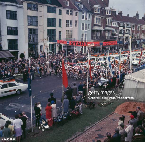 View of racing cyclists lining up together on the start line of the first stage of the 1969 Milk Race Tour of Britain in Worthing, West Sussex on...