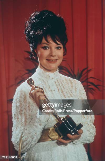 Russian film actress Ludmila Savelyeva pictured holding an Oscar statuette awarded to the film 'War and Peace' in the Best Foreign Language Film...