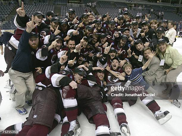 Members of the Hershey Bears celebrate winning the Calder Cup after defeating the Milwaukee Admirals in game six of the AHL Calder Cup Finals on June...