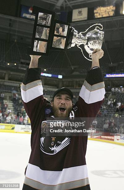 Graham Mink of the Hershey Bears celebrates with the Calder Cup after the Bears defeated the Milwaukee Admirals in game six of the AHL Calder Cup...