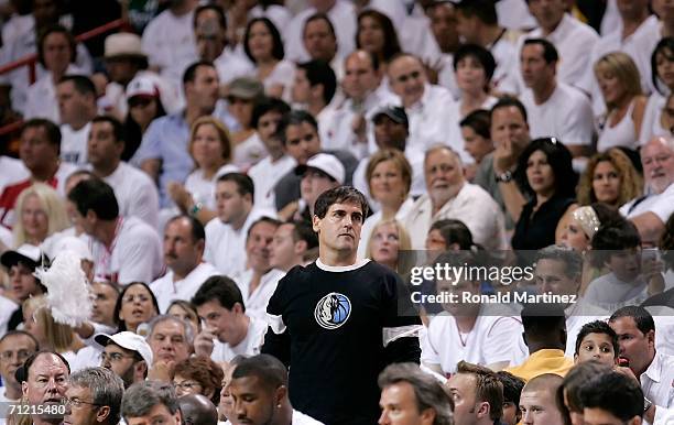 Owner Mark Cuban of the Dallas Mavericks stands out amid the "White Hot Heat" fans in the fourth quarter against the Miami Heat in game four of the...