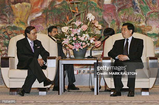 The Indian Minister of Petroleum and Natural Gas, Murali Deora meets with Chinese President Hu Jintao during their bilateral meeting at the Xijiao...