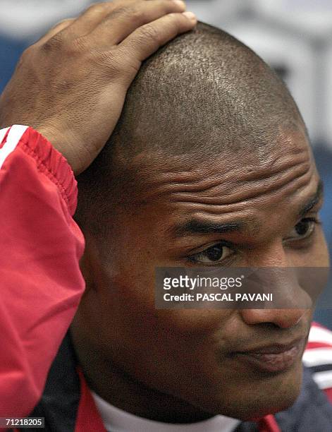 French midfielder Forent Malouda gestures during a press conference at the Rattenfanger Halle in Hameln 16 June 2006 during the Fifa World Cup 2006....