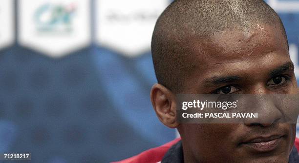 French midfielder Forent Malouda gestures during a press conference at the Rattenfanger Halle in Hameln 16 June 2006 during the Fifa World Cup 2006....