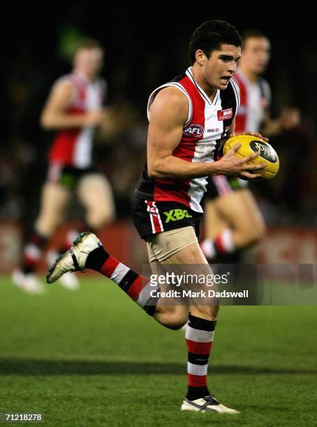 Leigh Montagna of the Saints gathers the ball during the round 12 AFL match between the St Kilda Saints and the Adelaide Crows at the Telstra Dome on...