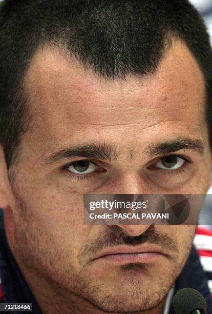 French defender Willy Sagnol gestures during a press conference at the Rattenfanger Halle in Hameln 16 June 2006 during the Fifa World Cup 2006....