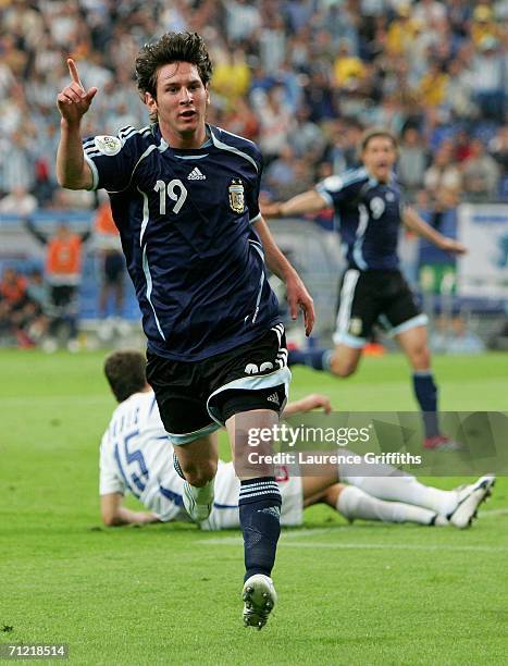 Lionel Messi of Argentina celebrates scoring the sixth goal during the FIFA World Cup Germany 2006 Group C match between Argentina and Serbia &...