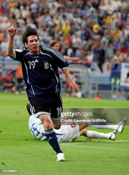 Lionel Messi of Argentina celebrates scoring the sixth goal during the FIFA World Cup Germany 2006 Group C match between Argentina and Serbia &...