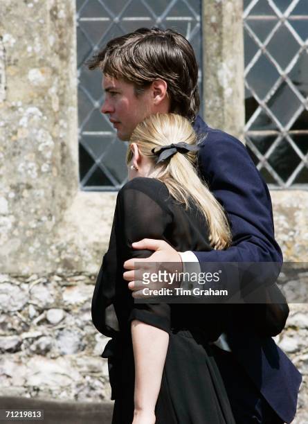 Laura Parker-Bowles is comforted by her husband, Harry Lopes at the funeral of her grandfather Major Bruce Shand at the Holy Trinity Church in...