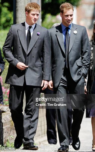 Prince William and Prince Harry attend the funeral of Major Bruce Shand at the Holy Trinity Church in Stourpaine on June 16, 2006 in Dorset, England.